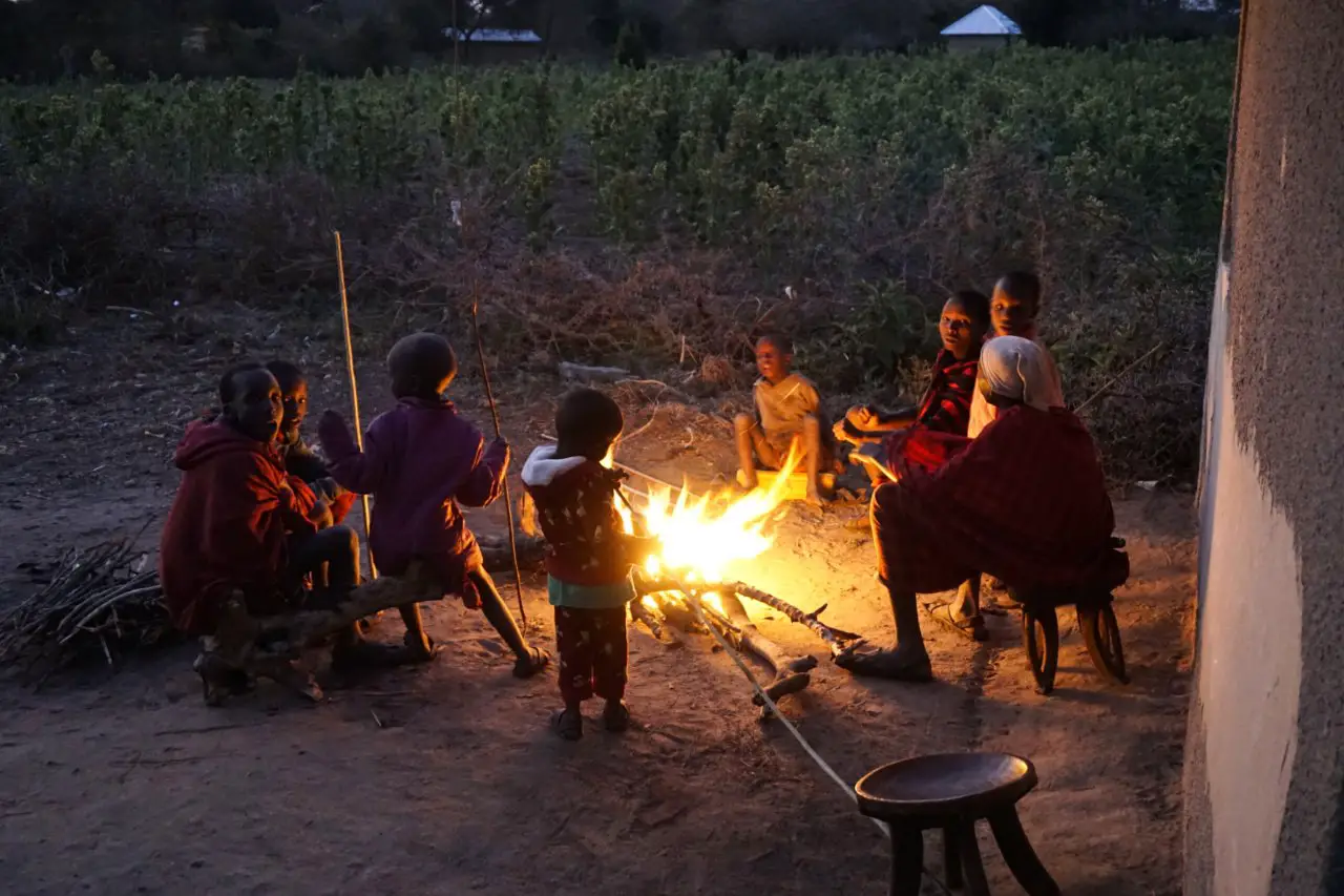 Masai children around a fire, Tanzania - Experiencing The Globe